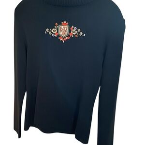 Bogner brand embroidery on black fine virgin wool, w/acrylic blend turtleneck